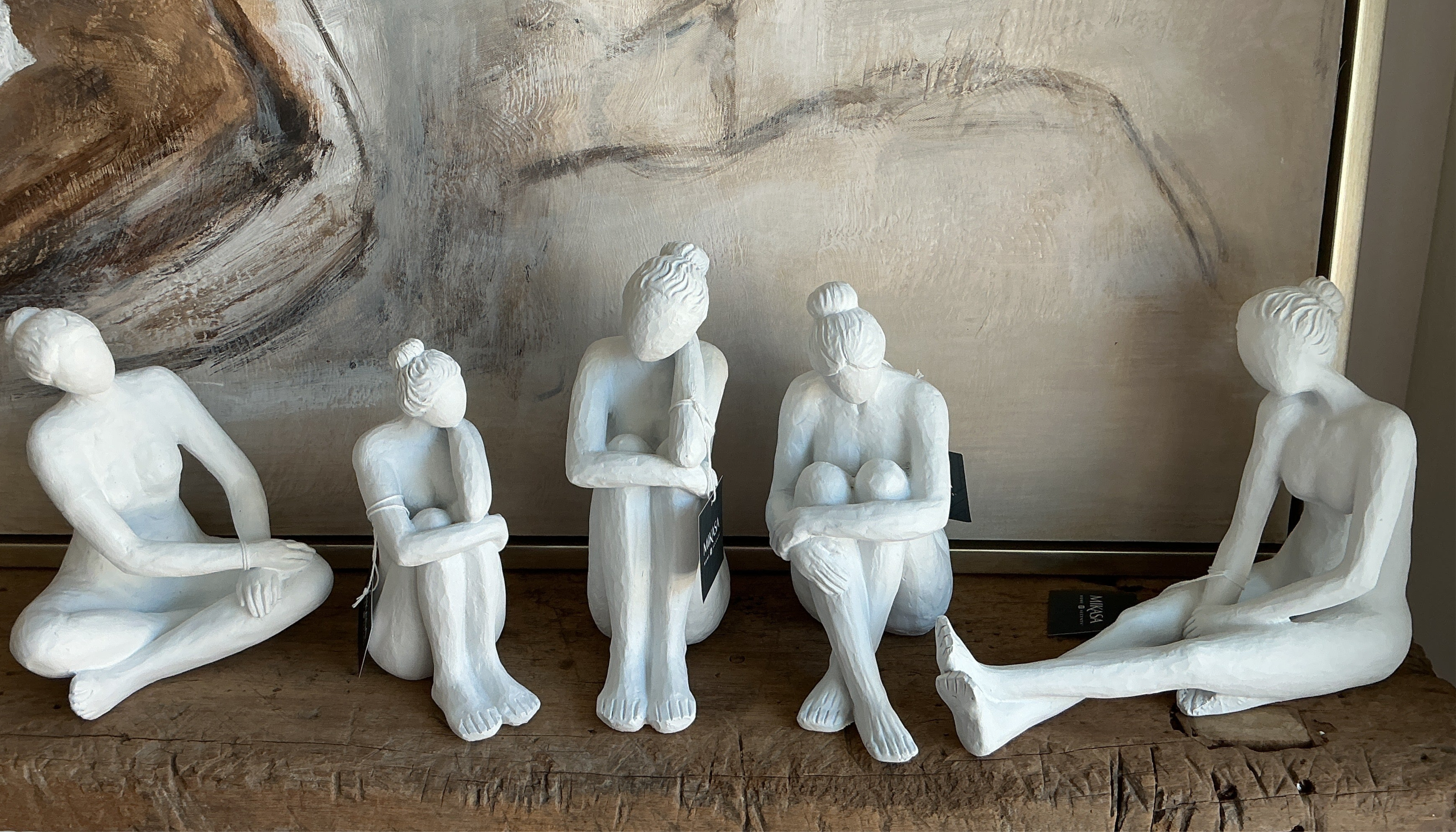 Cast Sitting Woman Fugurine