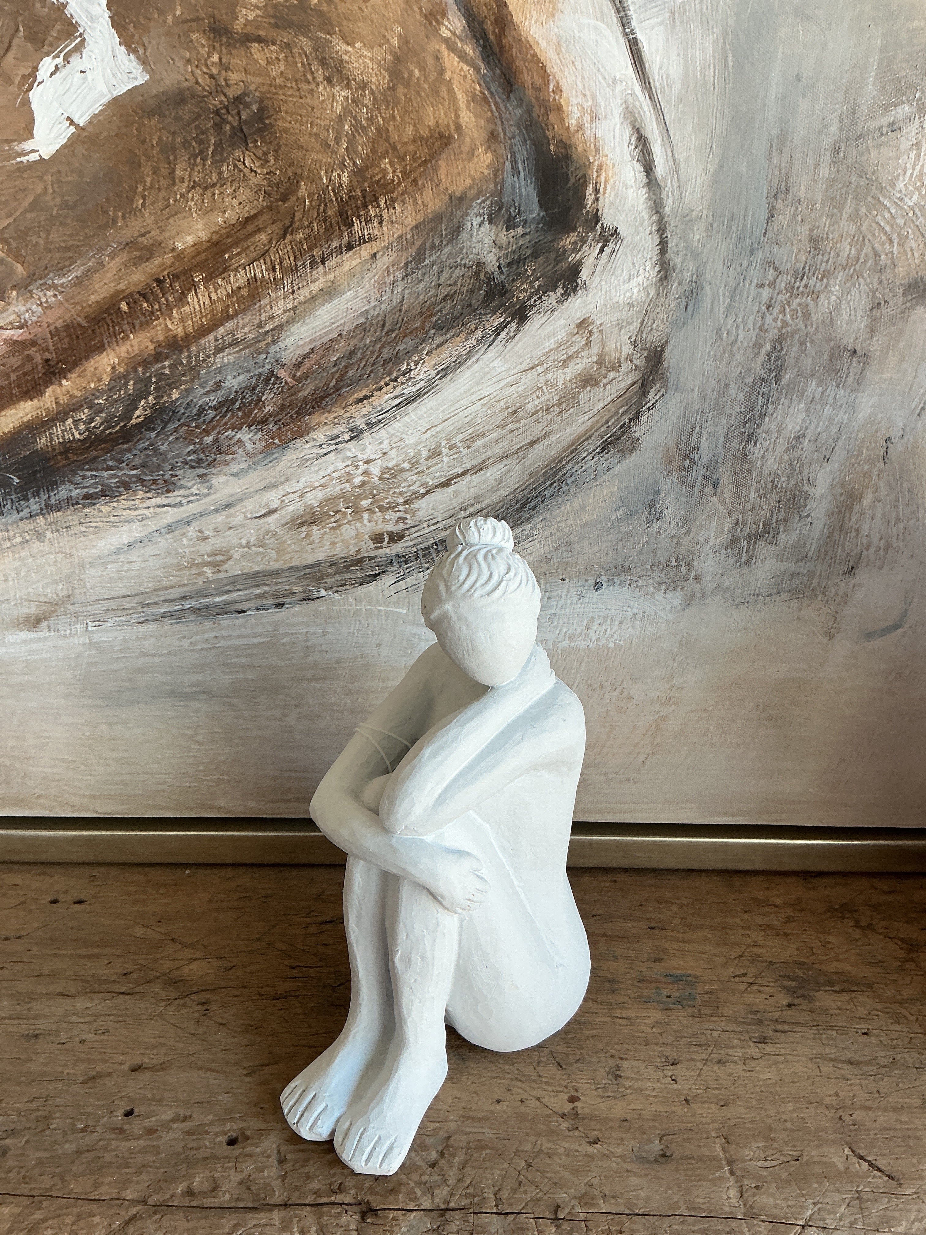 Cast Sitting Woman Fugurine